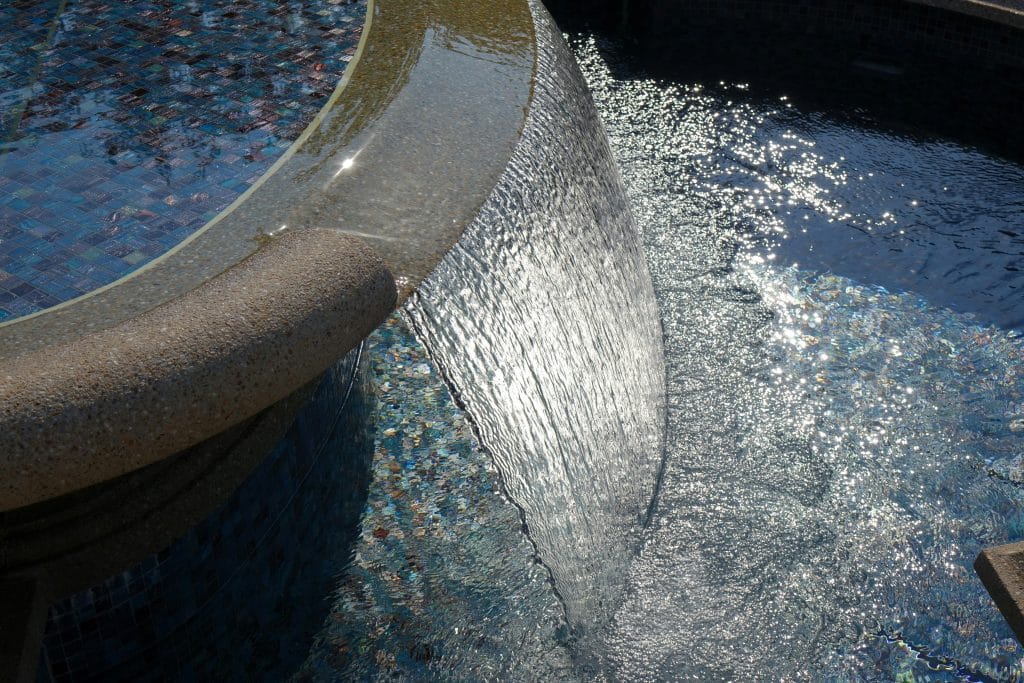 The Beauty and Benefits of Adding Water Features to Your Backyard Hardscape